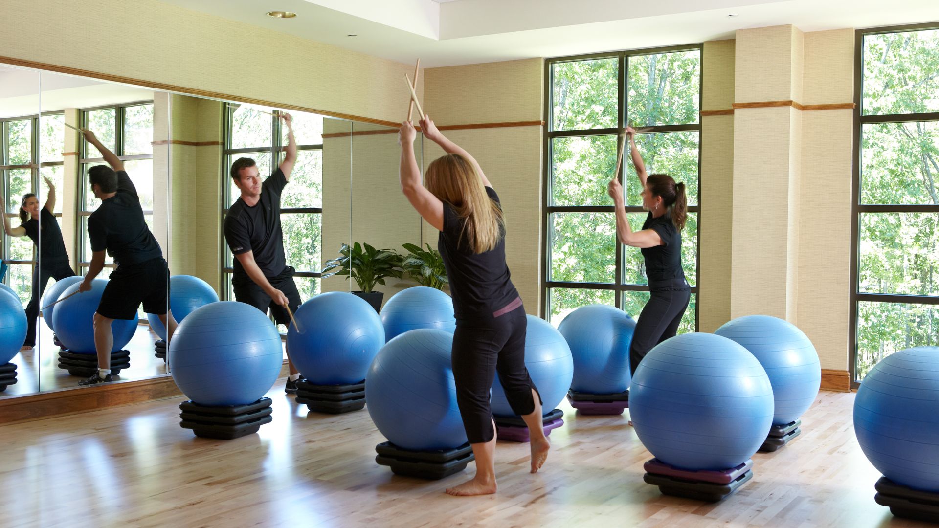 A Drums Alive class in a fitness studio at The Lodge at Woodloch