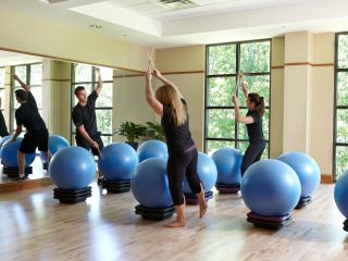 A Drums Alive class in a fitness studio at The Lodge at Woodloch