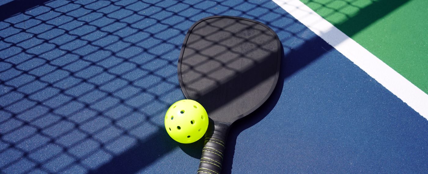 A Tennis Racket On A Tennis Court